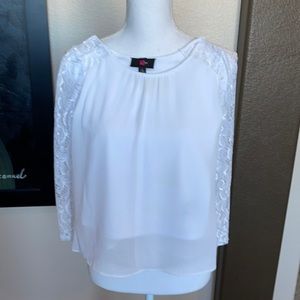 Elegant lace sleeve and sheer lined bodice top